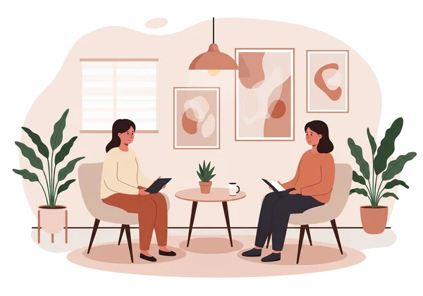 Therapist and client in a supportive, confidential therapy session