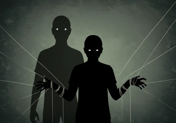 Person feeling controlled, manipulated by a shadow figure